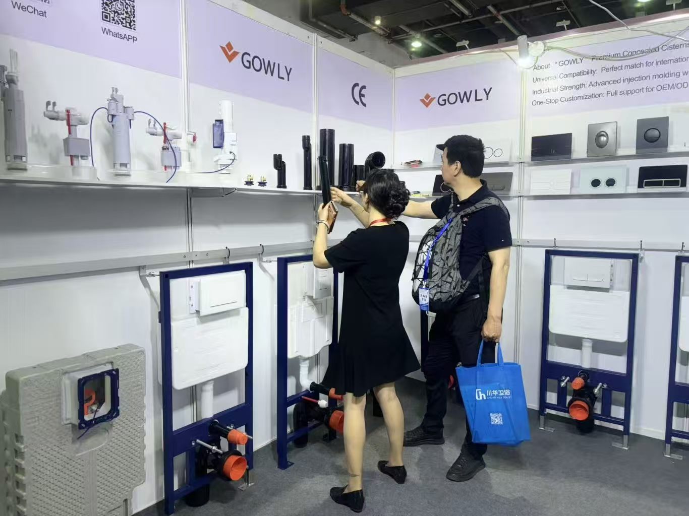 Exhibition Setup, Team Preparation, Display Adjustment, Behind the Scenes, Attention to Detail.